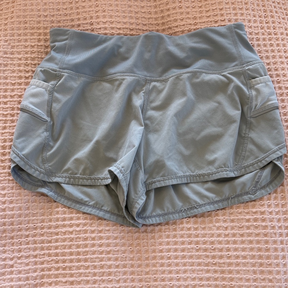 Athleta Light Gray Athletic Women's Running Shorts with Side Pockets